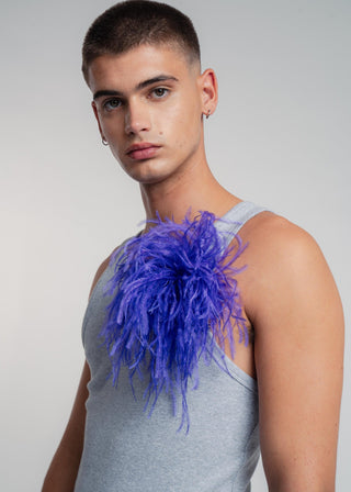 Unisex ostrich feather brooch accessory with a bold dark purple design.