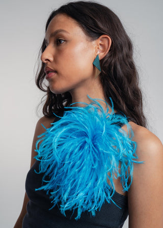 Unisex ostrich feather brooch accessory with a bold dark turkis design.