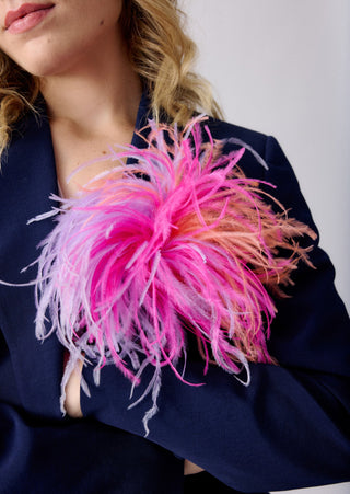 Fuchsia unisex tri-color ostrich feather brooch accessory.