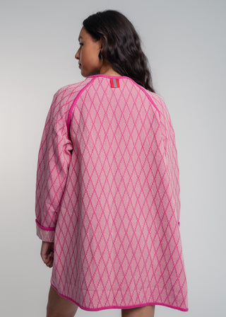 Unisex artist jacket in premium cotton with a bold fuchsia diamond design and pink finished edges.