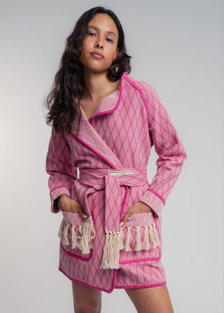 Unisex artist jacket in premium cotton with a bold fuchsia diamond design and pink finished edges.