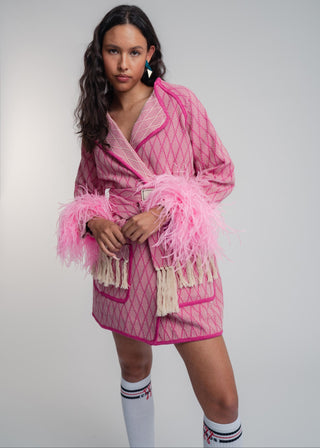 Unisex artist jacket in premium cotton with a bold fuchsia diamond design and pink finished edges.