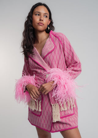 Unisex artist jacket in premium cotton with a bold fuchsia diamond design and pink finished edges.