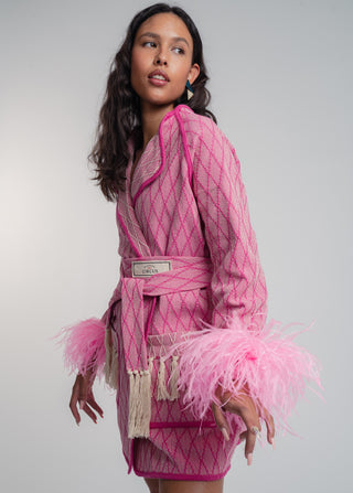 Unisex artist jacket in premium cotton with a bold fuchsia diamond design and pink finished edges.