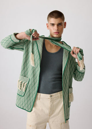 Unisex artist jacket in premium cotton with a bold green diamond design and green finished edges.