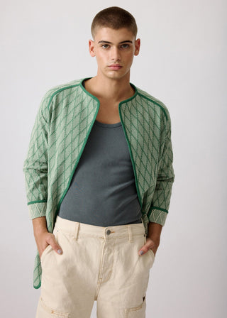 Unisex artist jacket in premium cotton with a bold green diamond design and green finished edges. 