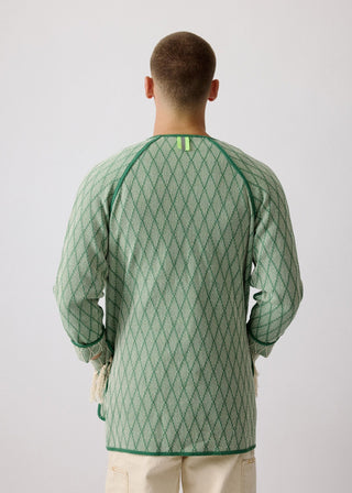 Unisex artist jacket in premium cotton with a bold green diamond design and green finished edges.