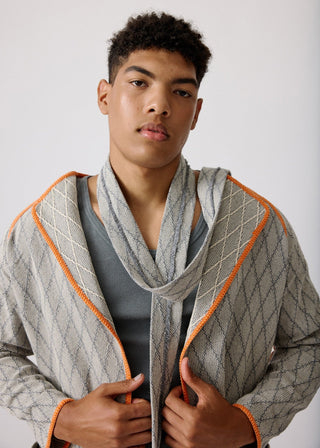 Unisex artist jacket in premium cotton with a bold grey diamond design and black finished edges.