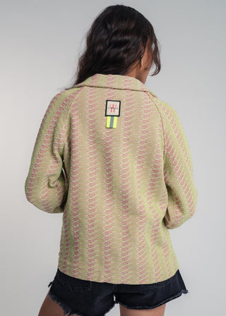 Back view of a unisex short jacket in premium cotton with a bold light green and hot pink duo-color design, featuring interchangeable buttons for a customizable look.