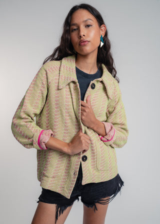 Unisex short jacket in premium cotton with a bold light green and hot pink duo-color design, featuring interchangeable buttons for a customizable look.