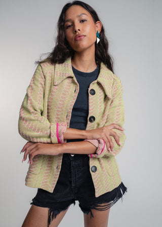 Unisex short jacket in premium cotton with a bold light green and hot pink duo-color design, featuring interchangeable buttons for a customizable look.
