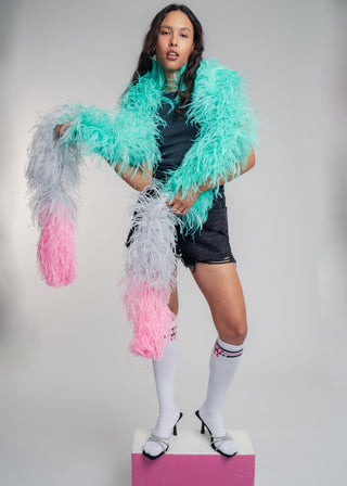 Luxurious two meter tricolor mint, grey and pink ostrich feather scarf boa. Made from the finest South African feathers, this accessory can be easily dressed up or down to make a statement with any look.