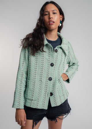 Unisex short jacket in premium cotton with a bold mint and navy duo-color design, featuring interchangeable buttons for a customizable look.