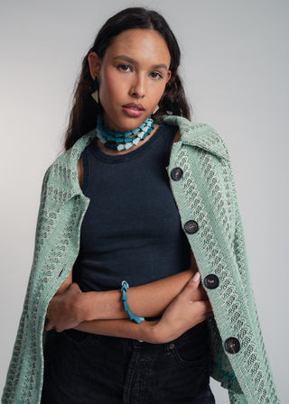 Unisex short jacket in premium cotton with a bold mint and navy duo-color design, featuring interchangeable buttons for a customizable look.