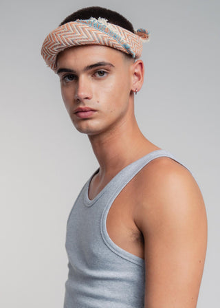Unisex bandana in premium ultralight cotton with a bold orange and turquoise duo-color design. Versatile styling accessory can be used to cover the hair, around the neck or even wrapped around the wrist as a bracelet.