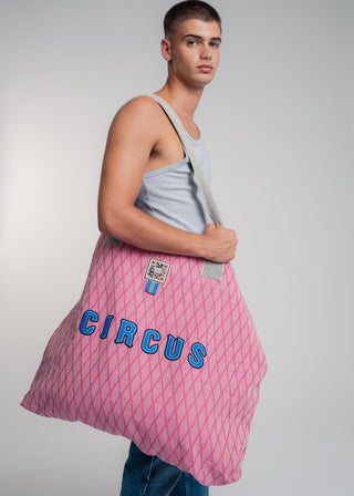 Oversized pink colored carryall made from durable all natural 4 ply cotton. Perfect for everyday shopping or weekend getaways this bag will help you organize everything.