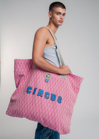 Oversized pink colored carryall made from durable all natural 4 ply cotton. Perfect for everyday shopping or weekend getaways this bag will help you organize everything.