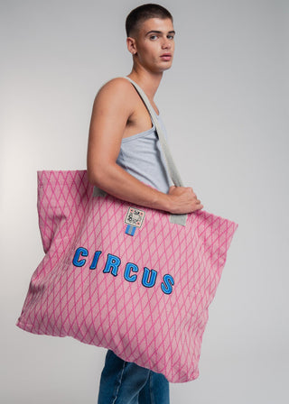 Oversized pink colored carryall made from durable all natural 4 ply cotton. Perfect for everyday shopping or weekend getaways this bag will help you organize everything.