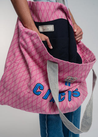 Oversized pink colored carryall made from durable all natural 4 ply cotton. Perfect for everyday shopping or weekend getaways this bag will help you organize everything.