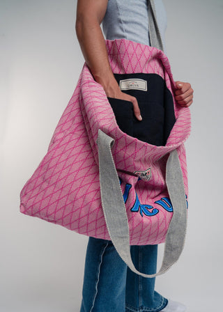 Oversized pink colored carryall made from durable all natural 4 ply cotton. Perfect for everyday shopping or weekend getaways this bag will help you organize everything.
