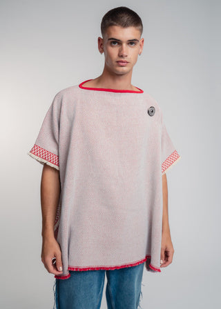 Unisex reversible poncho in premium cotton with a bold red and light gray duo-color design, featuring a bold statement button.