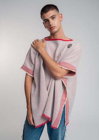 Unisex reversible poncho in premium cotton with a bold red and light gray duo-color design, featuring a bold statement button.