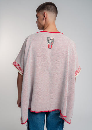 Unisex reversible poncho in premium cotton with a bold red and light gray duo-color design, featuring a bold statement button.
