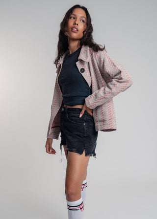Side view of a unisex short jacket in premium cotton with a bold red and light grey duo-color design, featuring interchangeable buttons for a customizable look.