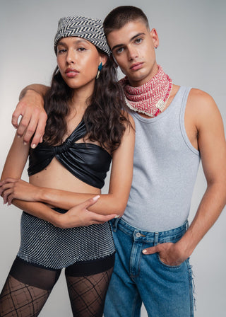 Unisex bandana in premium ultralight cotton with a bold red and light gray duo-color design. Versatile styling accessory can be used to cover the hair, around the neck or even wrapped around the wrist as a bracelet.
