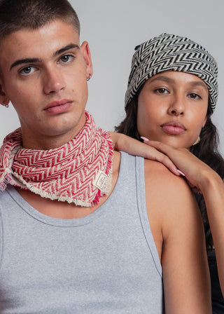 Unisex bandana in premium ultralight cotton with a bold red and light gray duo-color design. Versatile styling accessory can be used to cover the hair, around the neck or even wrapped around the wrist as a bracelet.