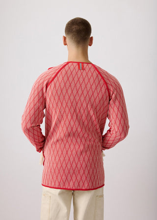 Unisex artist jacket in premium cotton with a bold red diamond design and red finished edges.