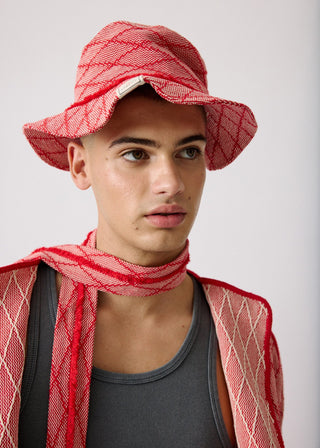 Unisex artist jacket in premium cotton with a bold red diamond design and red finished edges.
