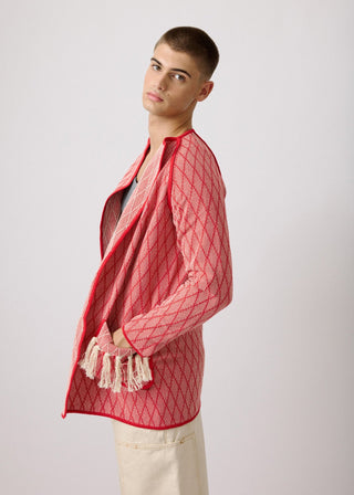 Unisex artist jacket in premium cotton with a bold red diamond design and red finished edges.